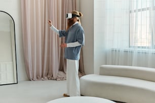 a woman standing in front of a mirror wearing a virtual reality headset