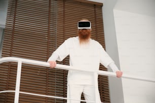 a man with a red beard wearing a blindfold