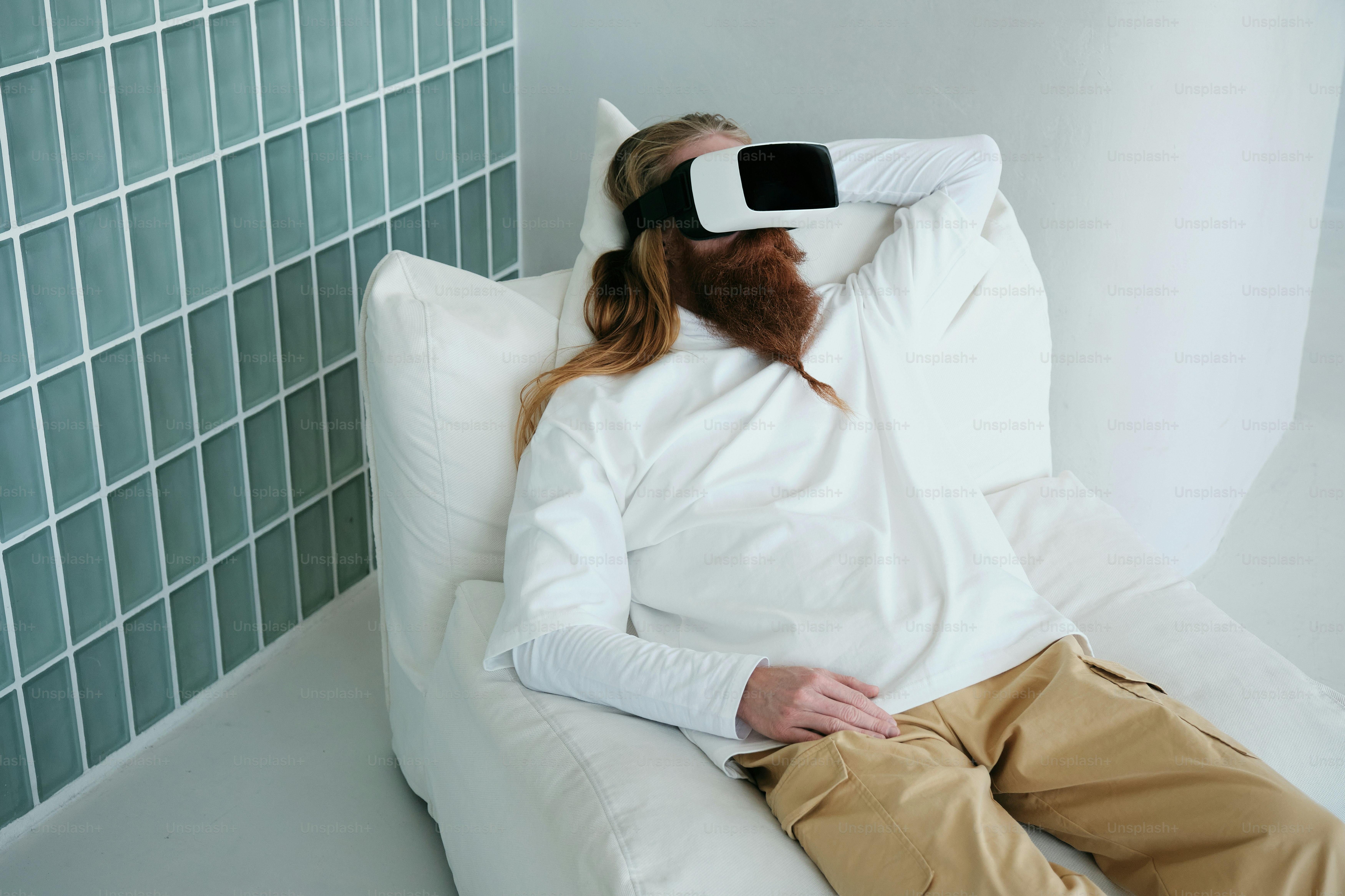 a man watching something in VR headset