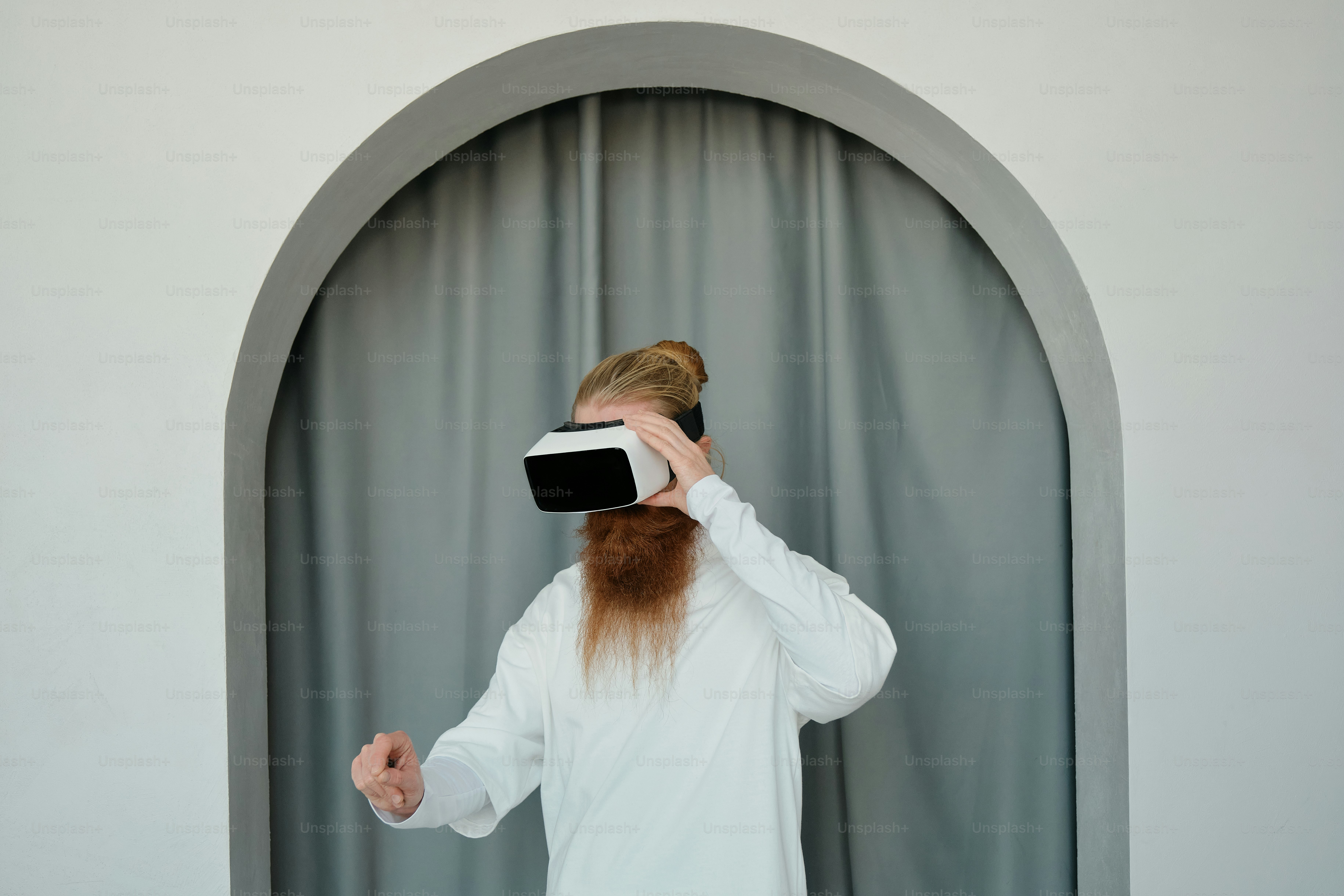 a man working in VR headset