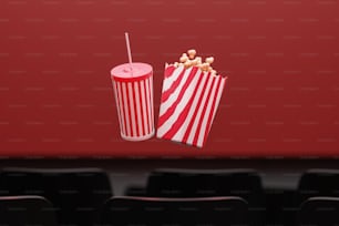 a red and white striped bag of popcorn and a red and white striped bag of
