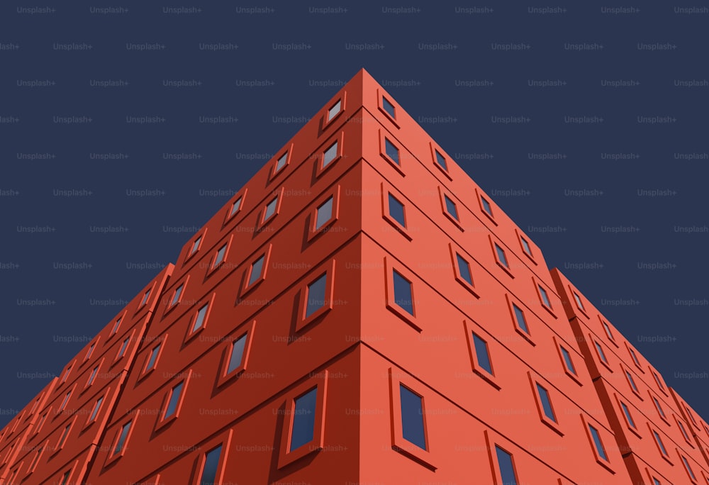 Ein sehr hohes rotes Gebäude mit vielen Fenstern