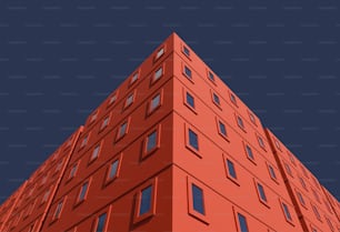 Un très grand bâtiment rouge avec beaucoup de fenêtres