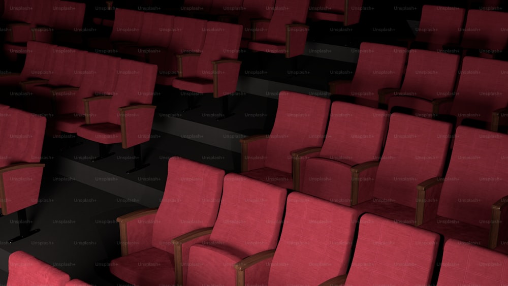 a row of red chairs sitting next to each other