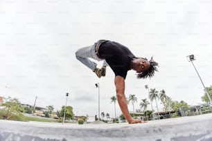 a man doing a trick on a skateboard