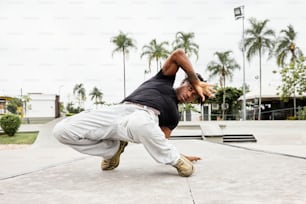 a man is doing a trick on a skateboard