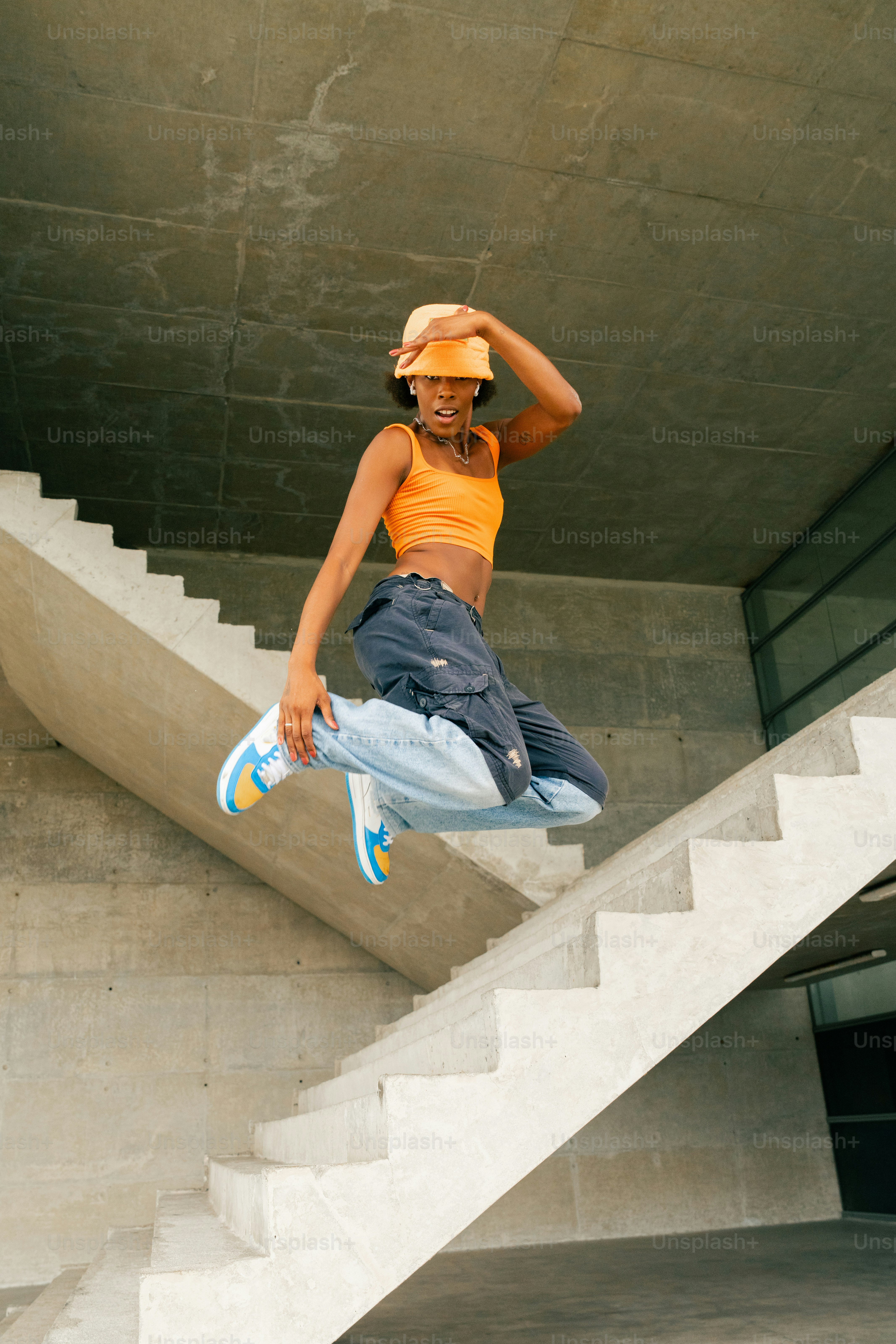 a person jumping in the air on a skateboard
