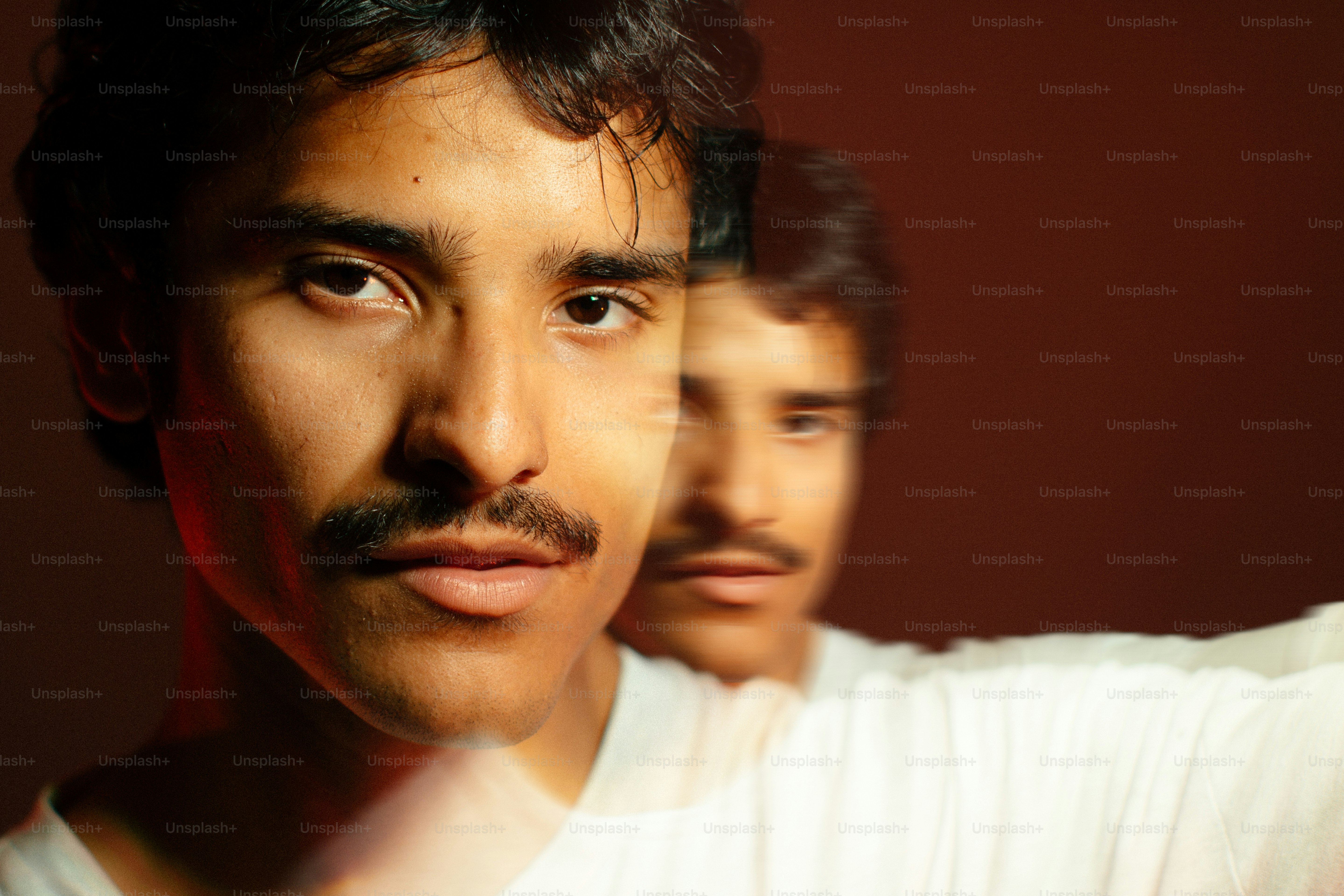 a close up of a person with a mustache