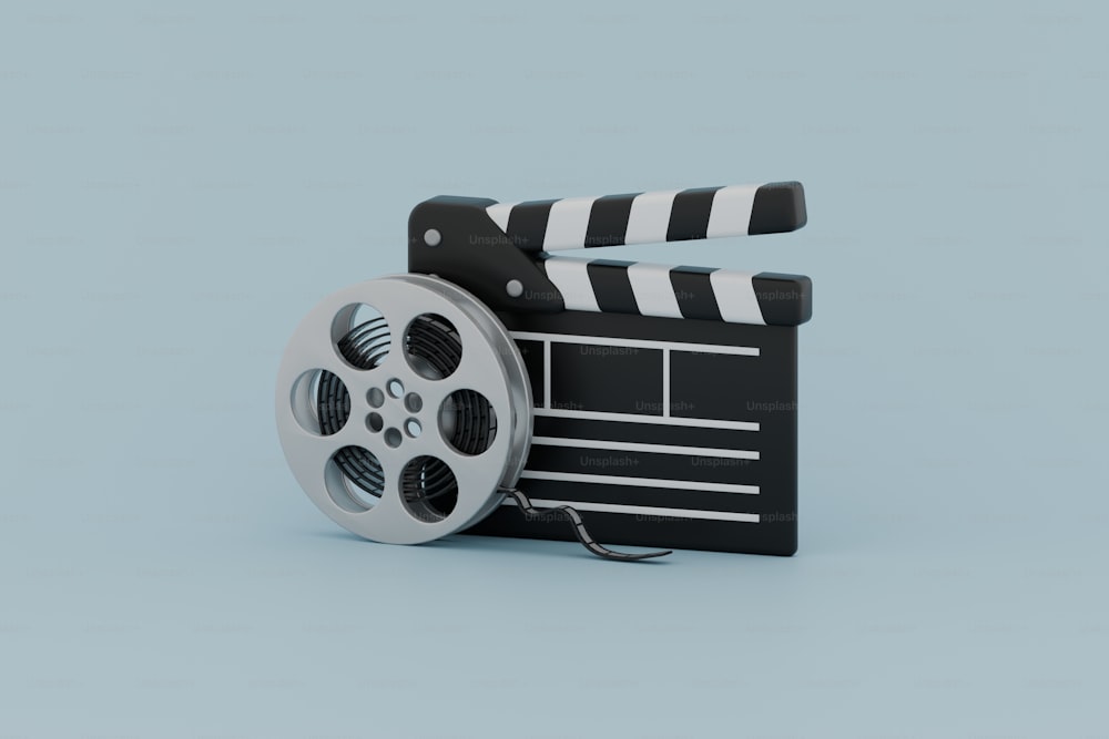 a movie clapper and a movie reel