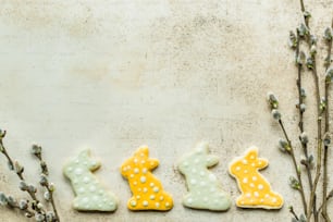 a number of decorated cookies sitting on top of a table