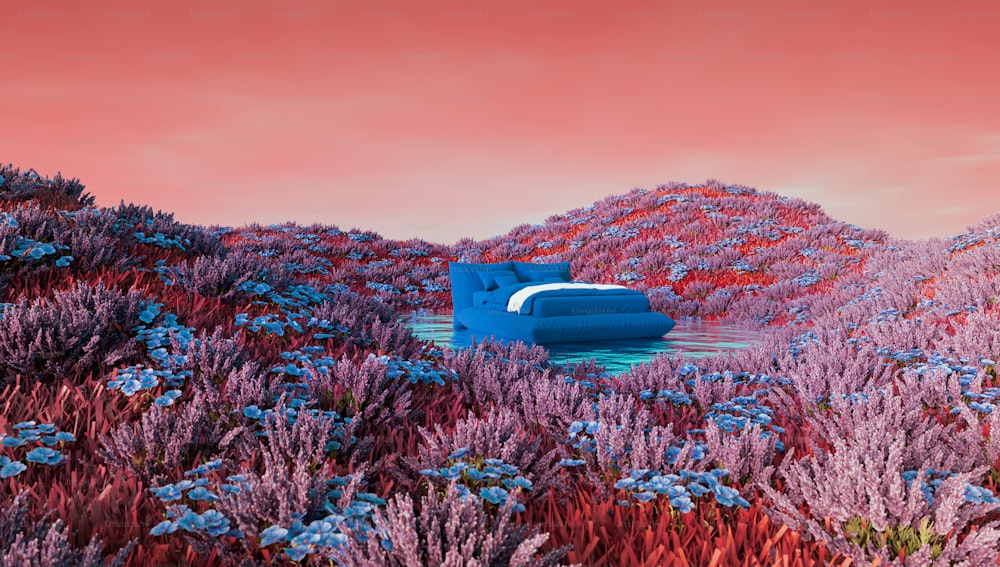 a blue couch sitting in a field of purple flowers