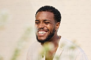 a close up of a person with a smile on his face