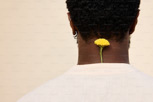 a woman with a flower in her hair