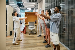 a group of people standing in a room