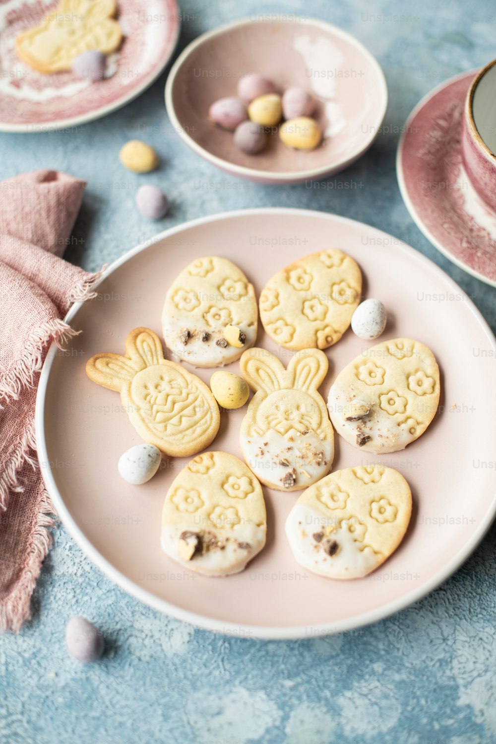 a plate of cookies with bunny ears on them