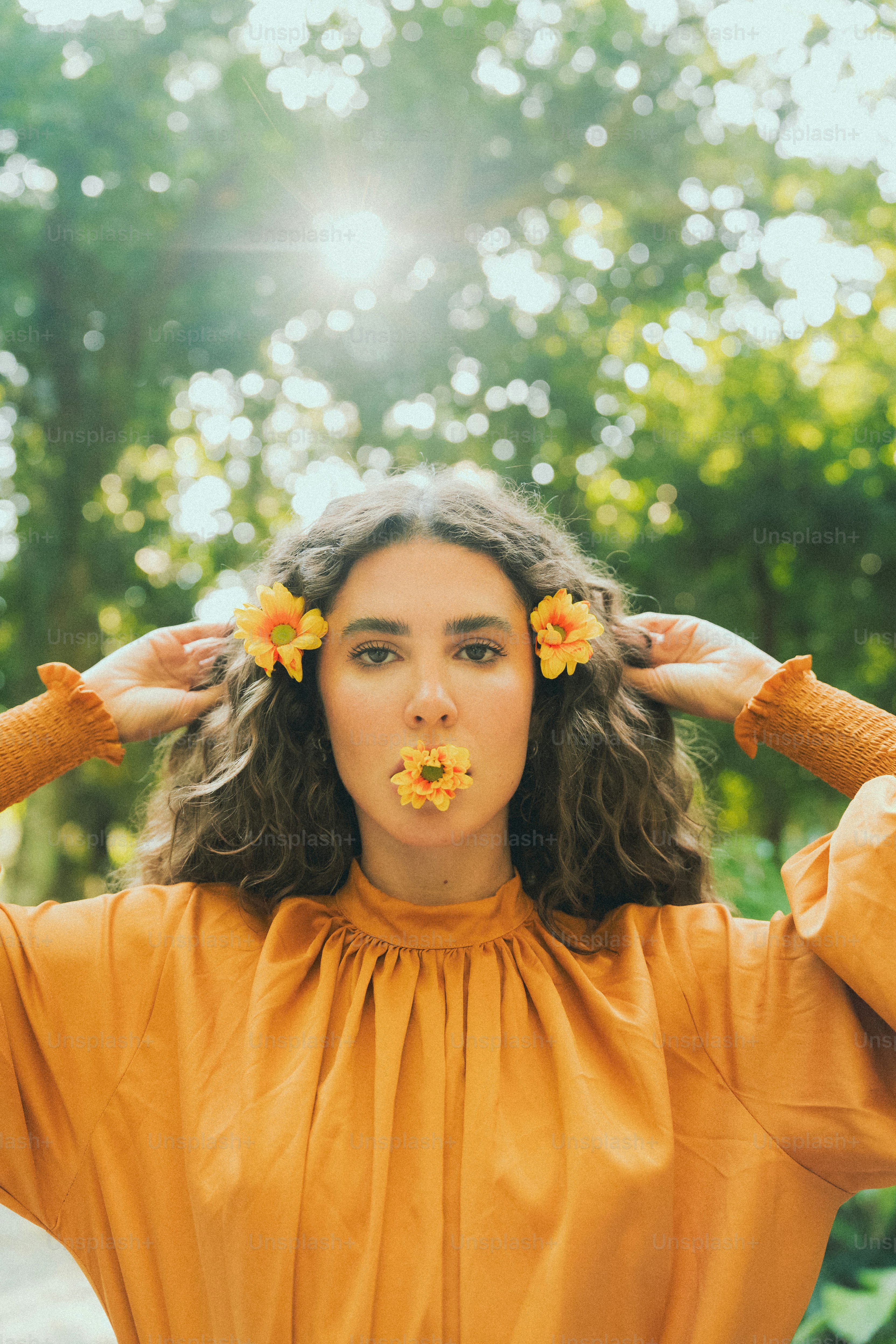 A woman with a flower in her hair photo – Spring Image on Unsplash