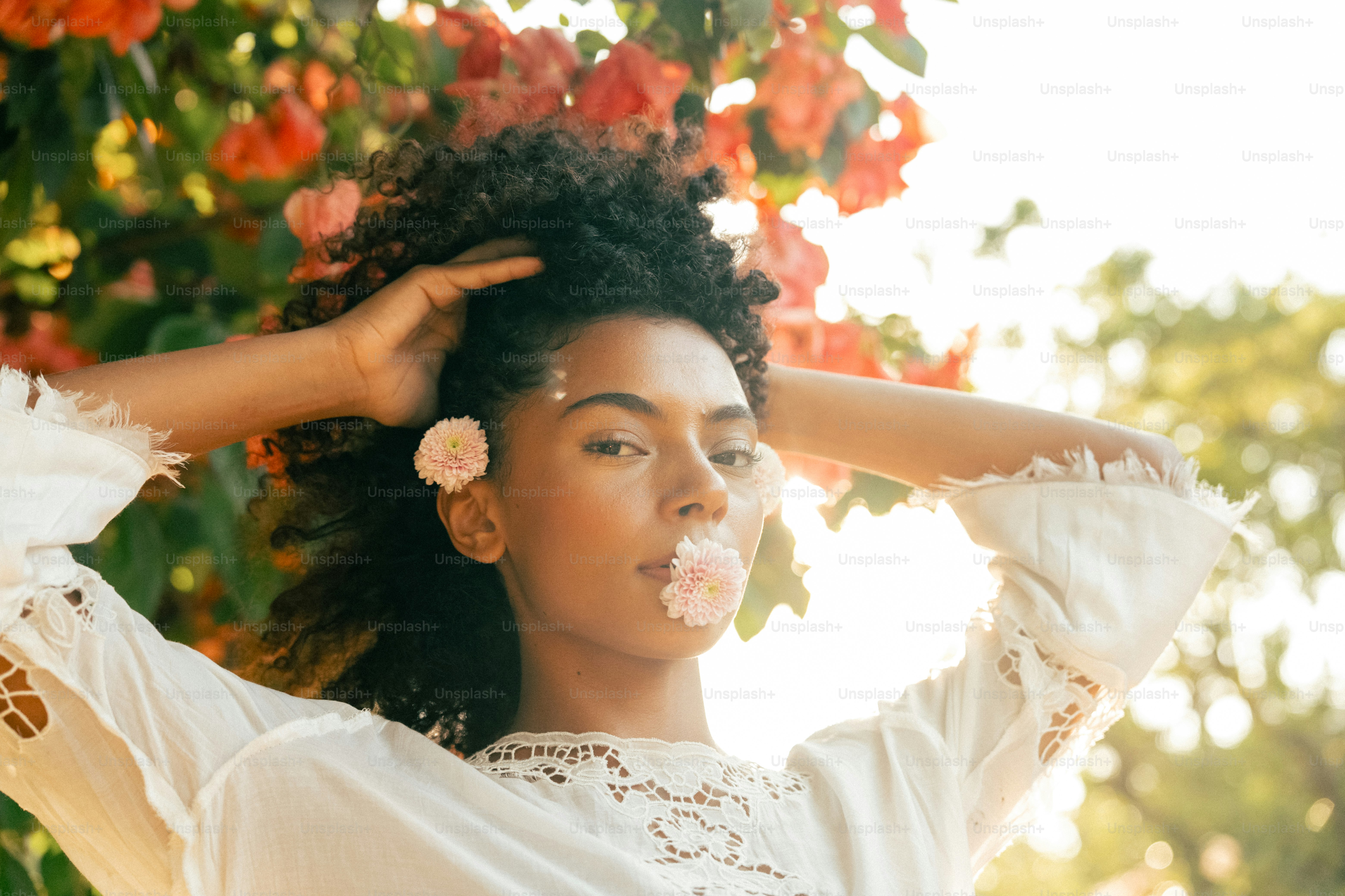 a woman with flowers in her hair
