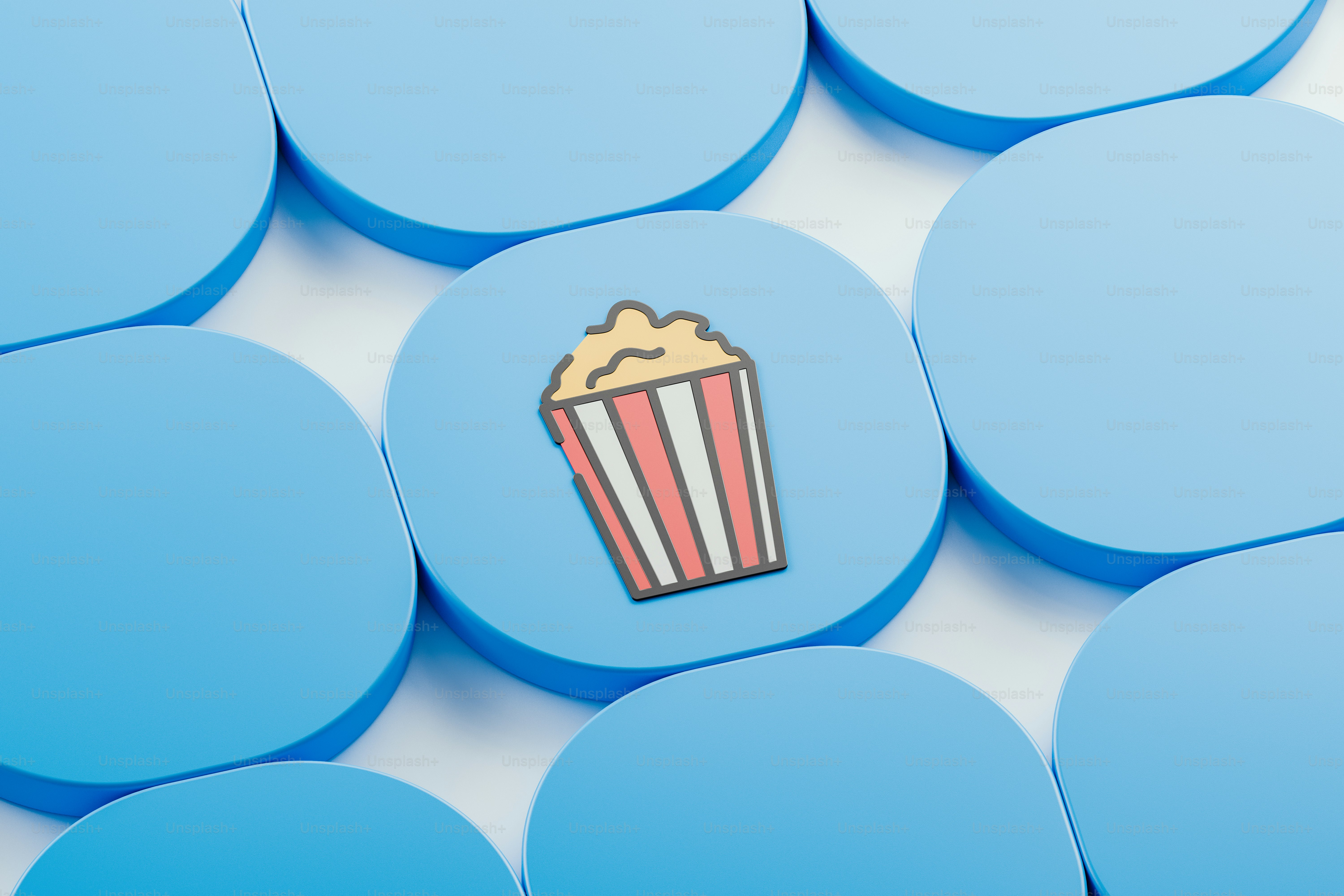 a popcorn cup sitting on top of blue circles