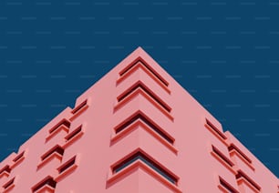 a tall pink building with a sky background