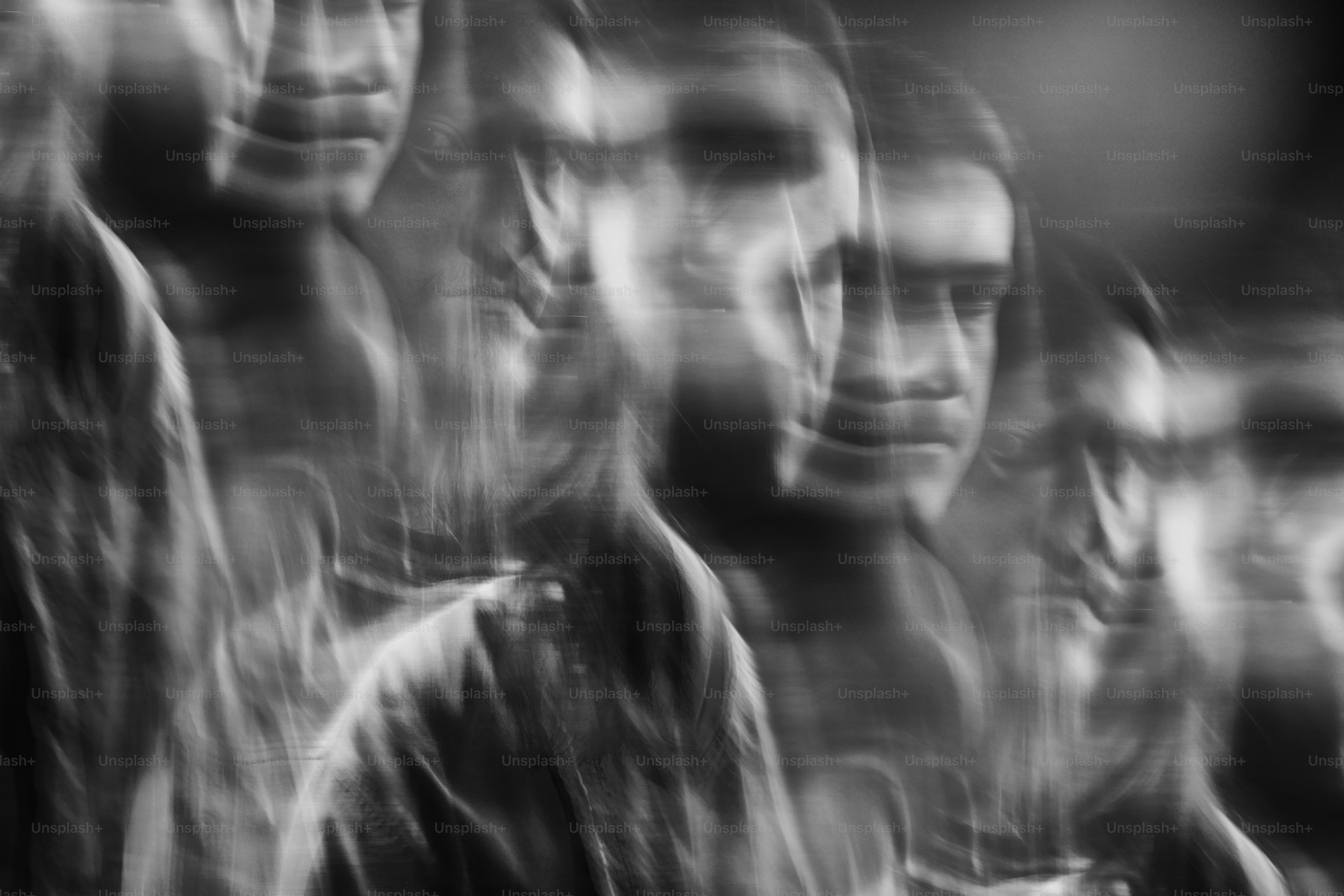 a black and white photo of a group of people