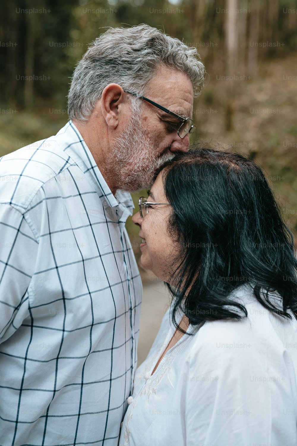 a man and a woman standing next to each other