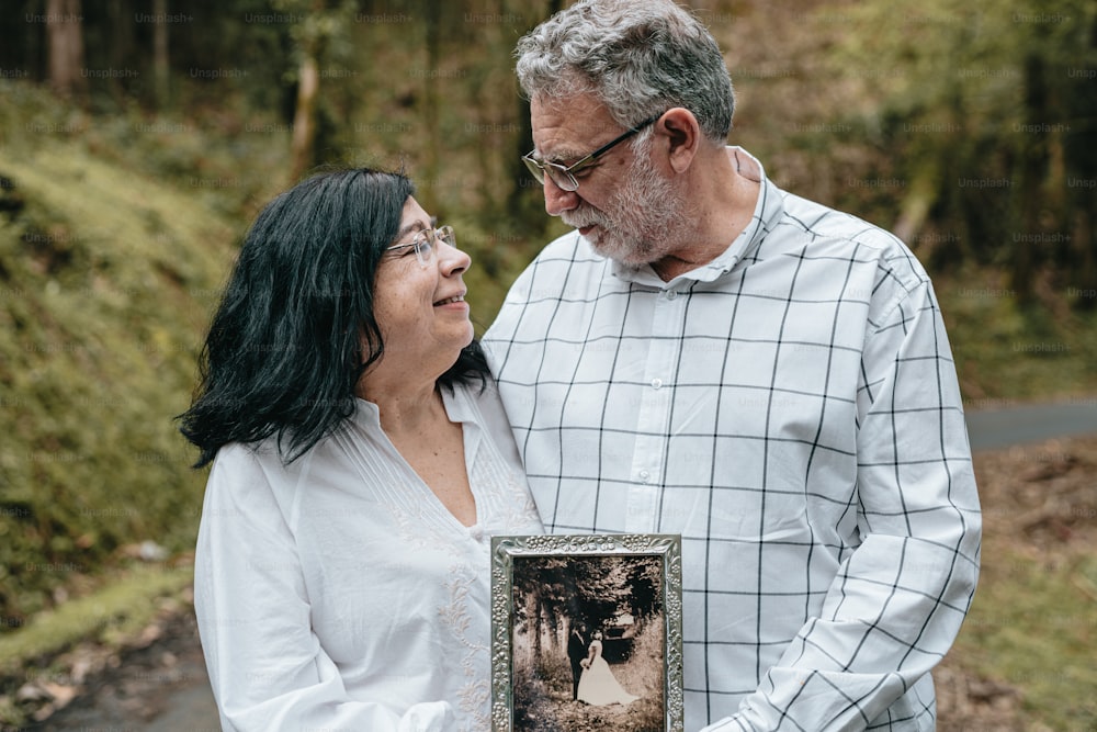 a man and a woman standing next to each other