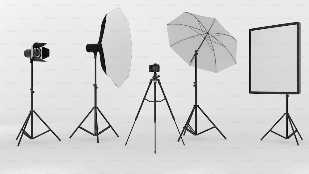 a group of photography equipment with a white background