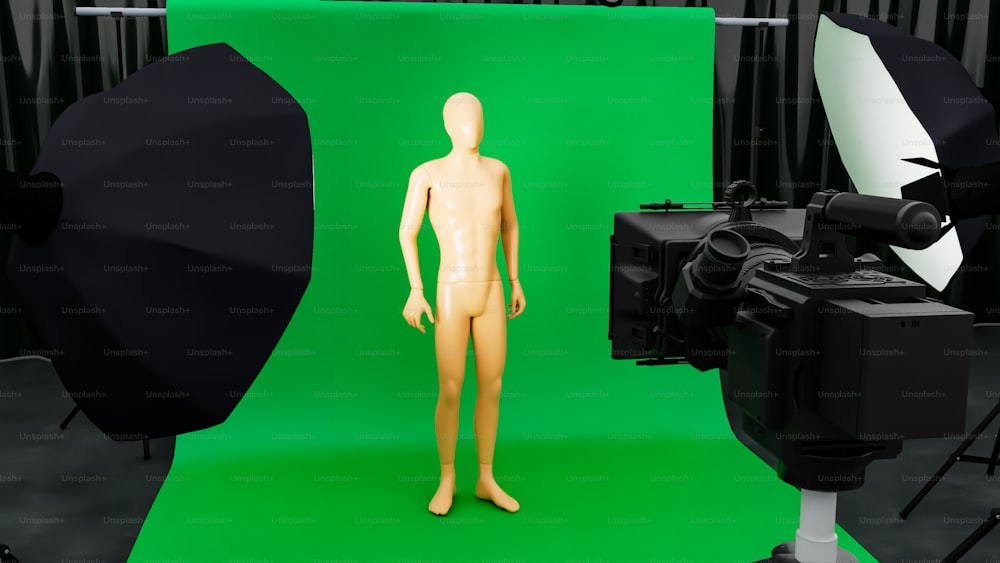 a mannequin standing in front of a green screen