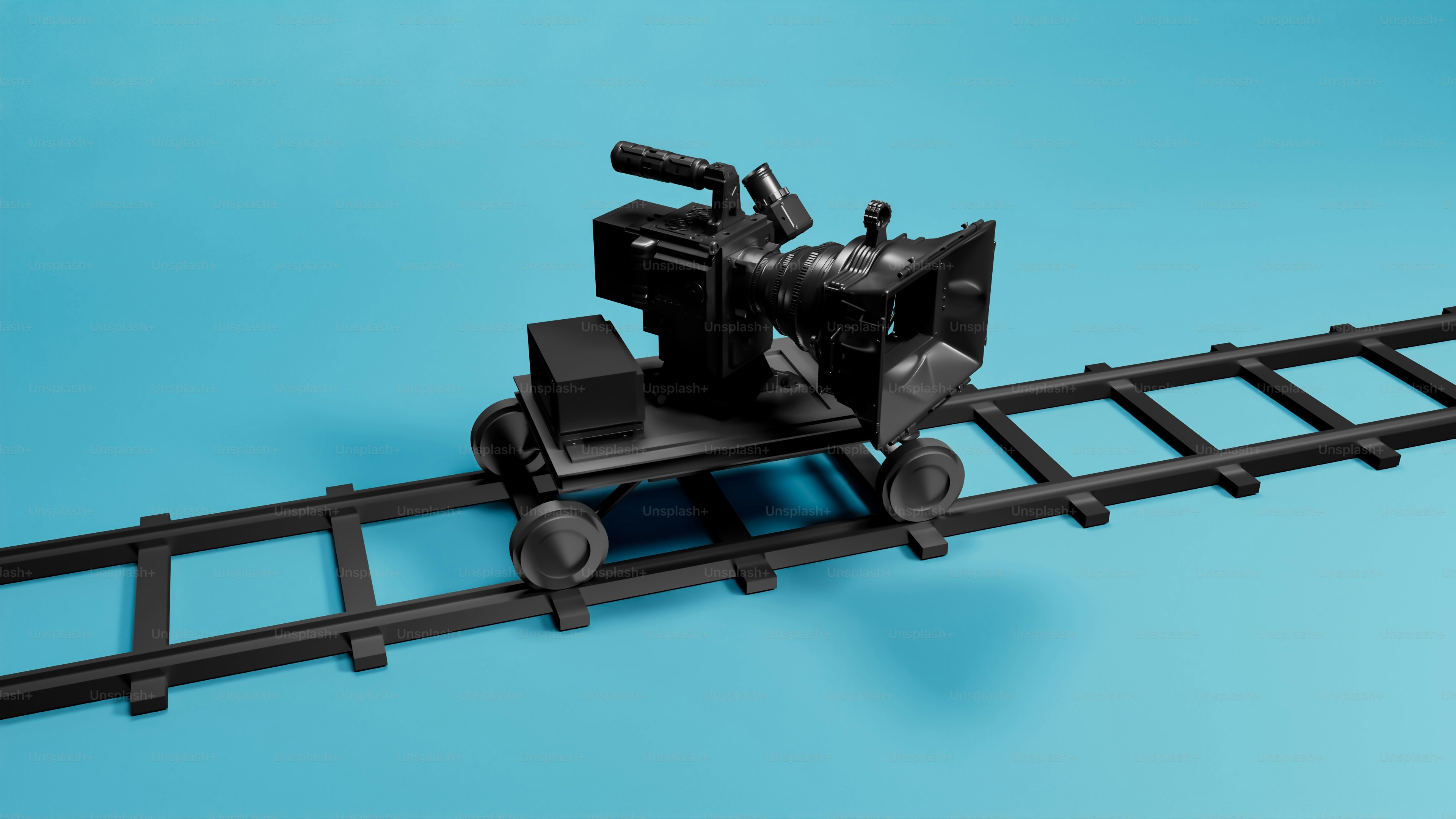 a camera is sitting on top of a train track