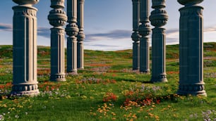 a bunch of pillars that are in the grass