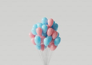 a bunch of balloons floating in the air