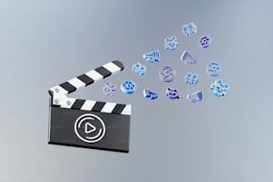 a movie clapper with a bunch of icons coming out of it