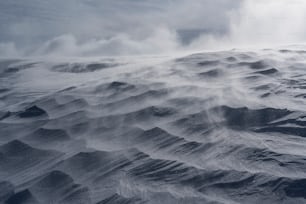 a large amount of snow on top of a mountain