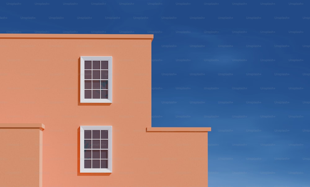 a pink building with three windows and a blue sky in the background