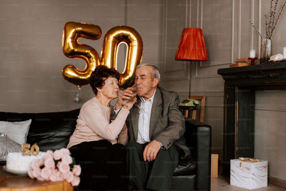 a man and a woman sitting on a couch