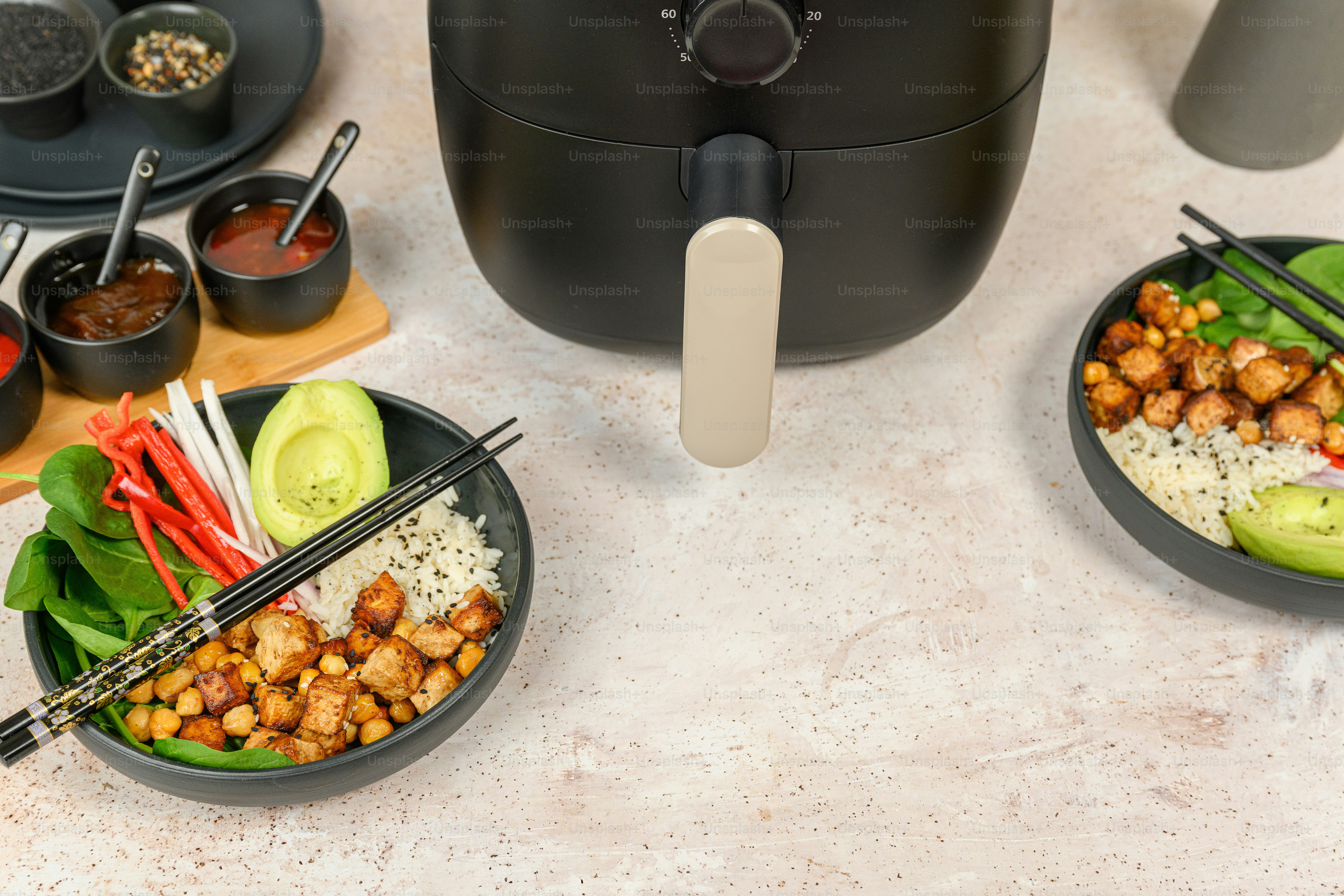 a couple of bowls of food on a table