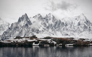 a mountain range with snow on top of it