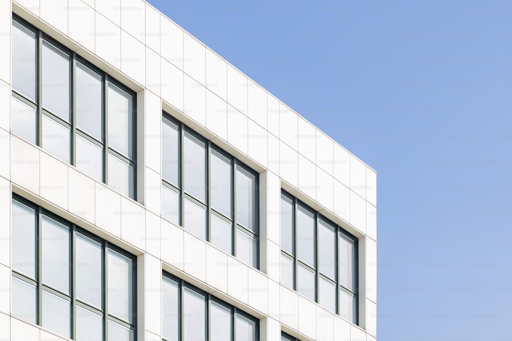 a large white building with many windows on it