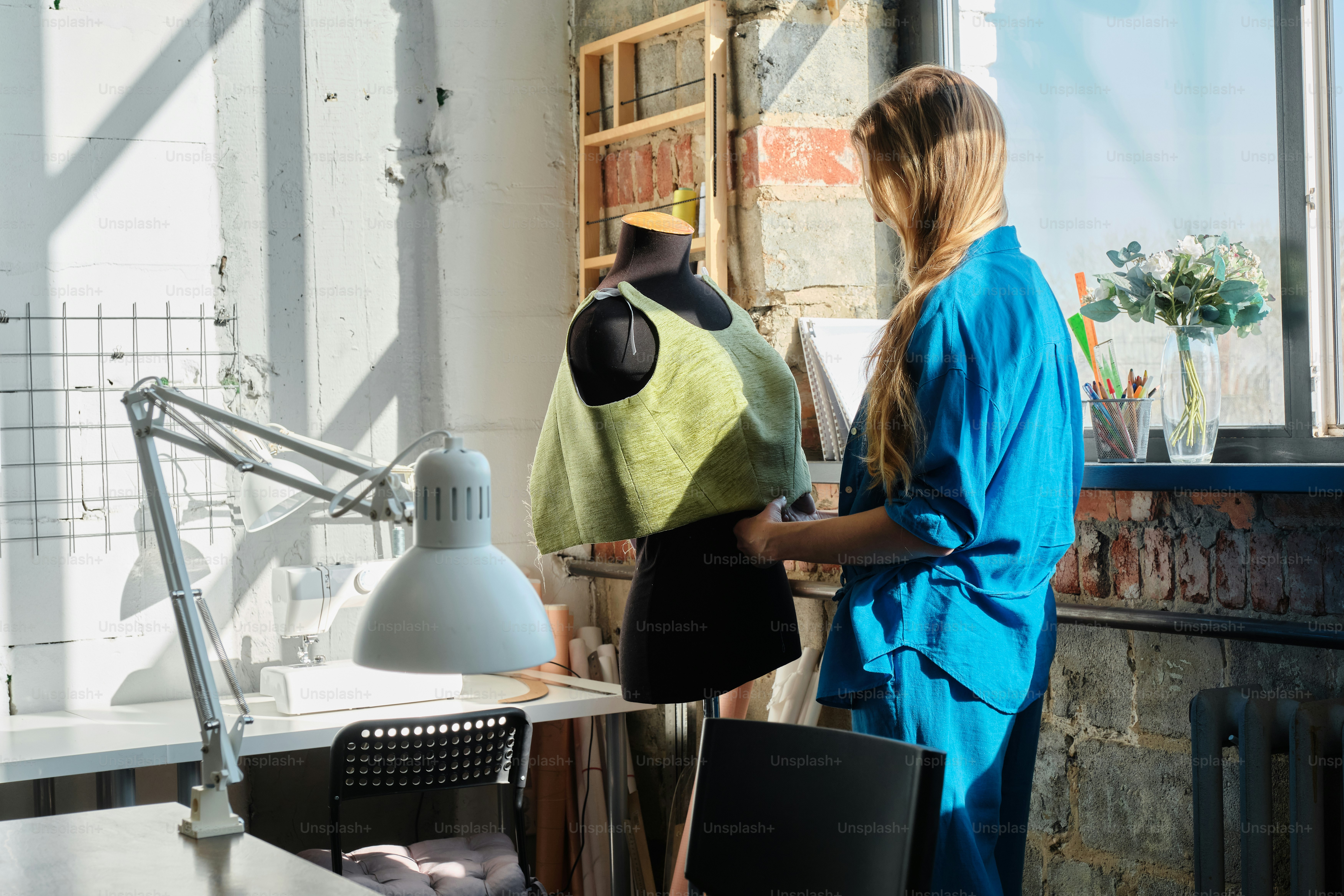 a couple of women standing next to each other in a room
