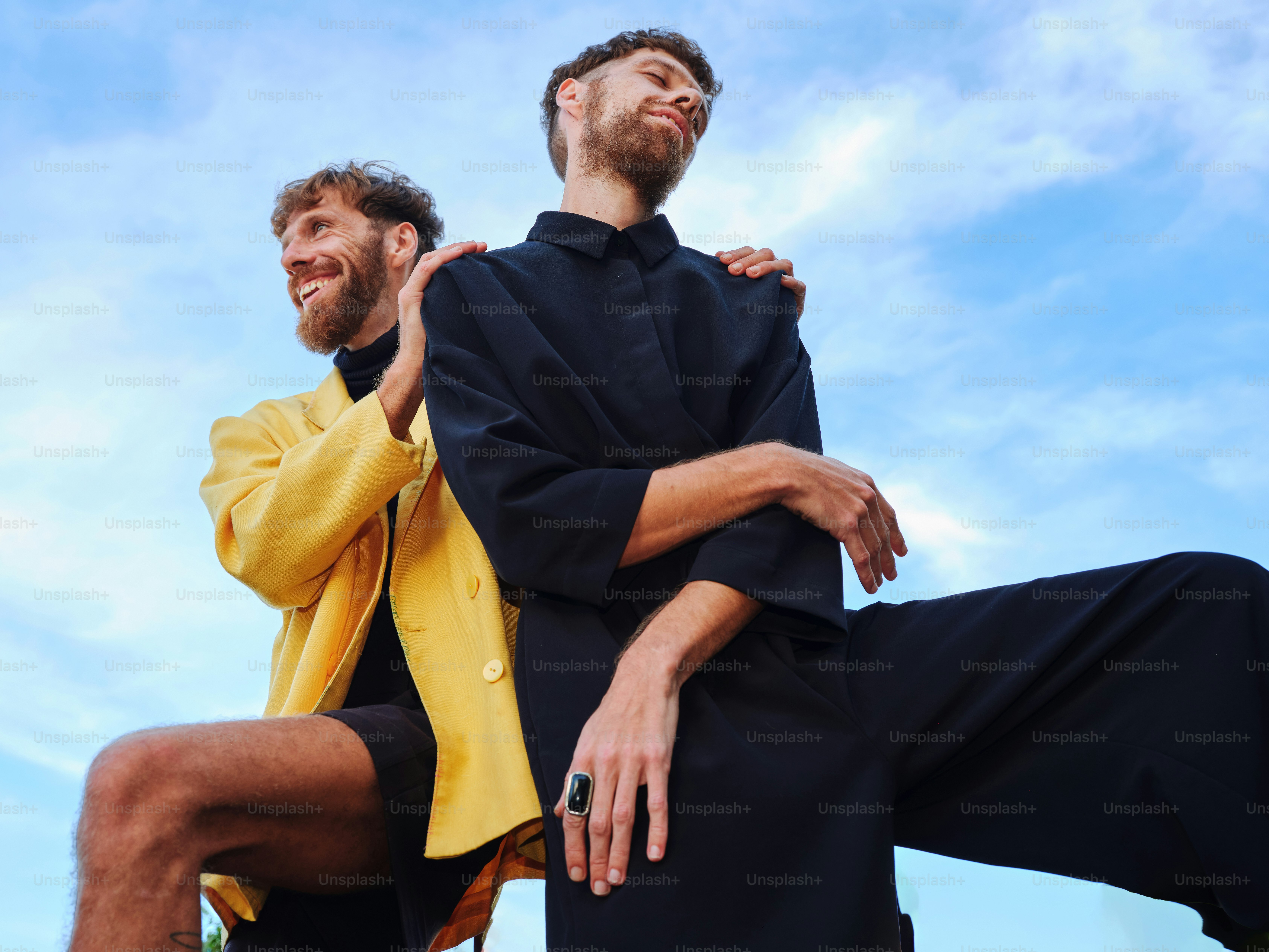 a couple of men standing next to each other