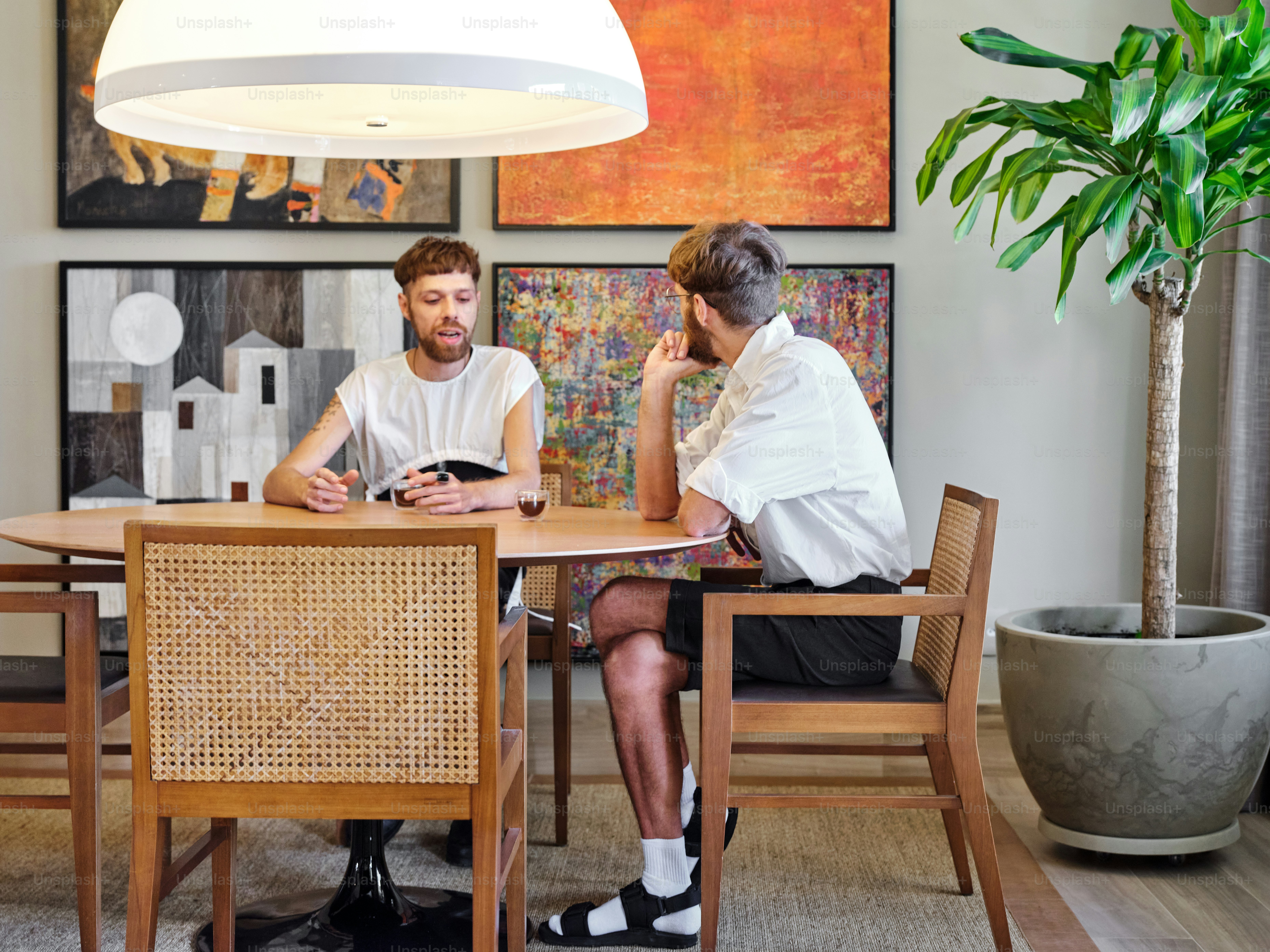 a man and a woman sitting at a table