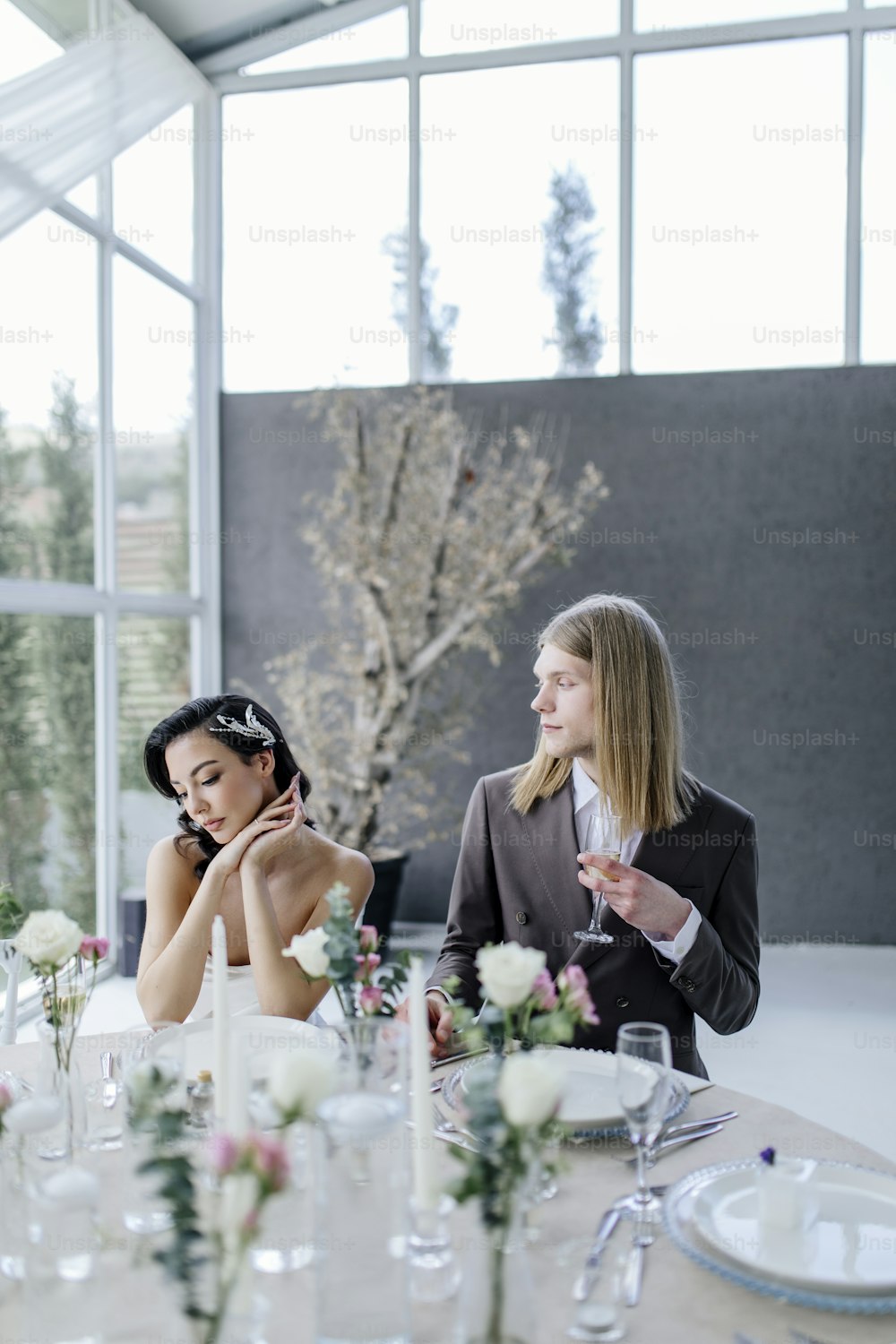 a couple of women sitting at a table