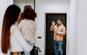 a man is taking a picture of himself in the mirror