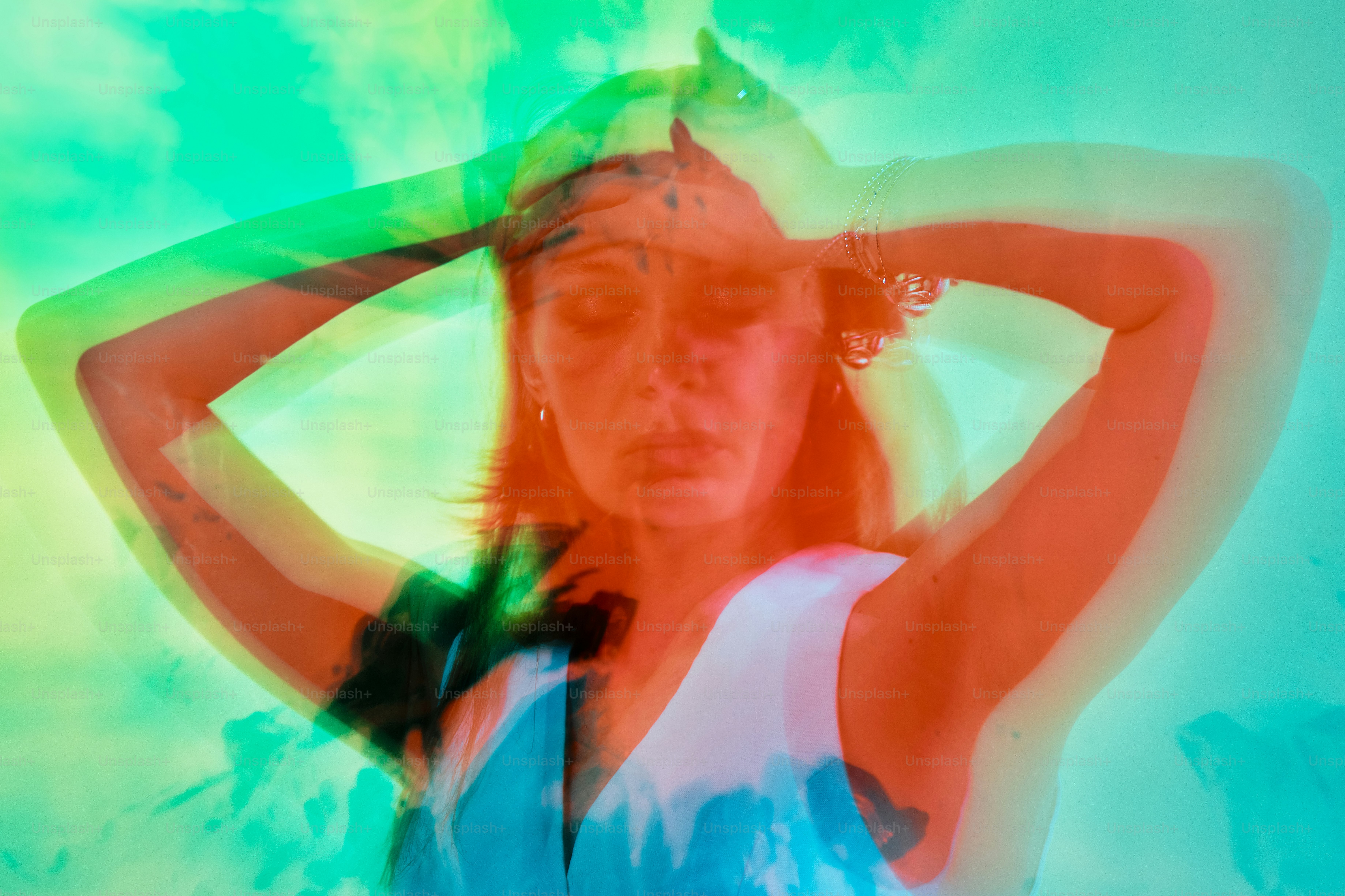 a woman with her hands on her head