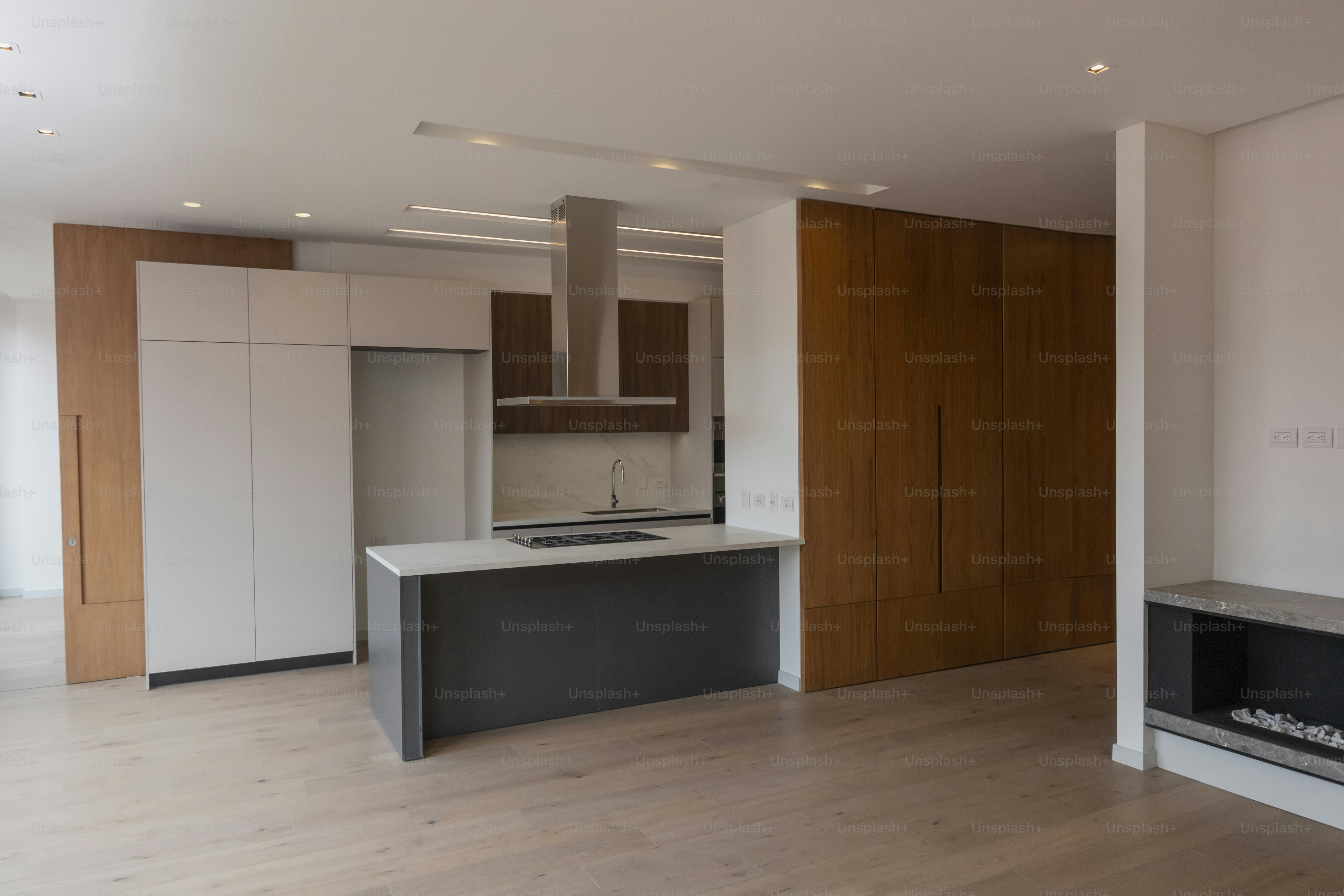 a kitchen with a stove top oven sitting inside of it