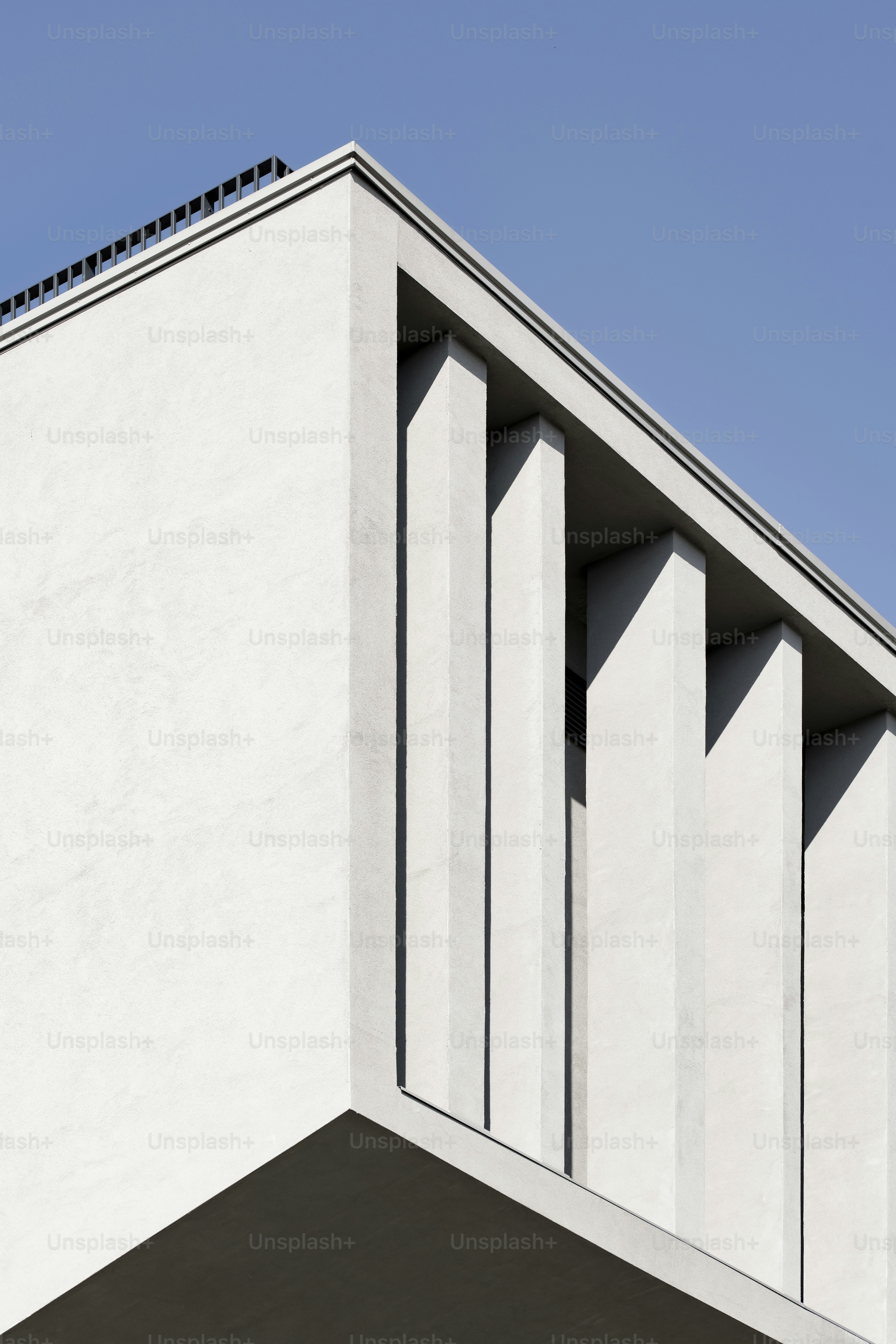 a tall building with a clock on the side of it