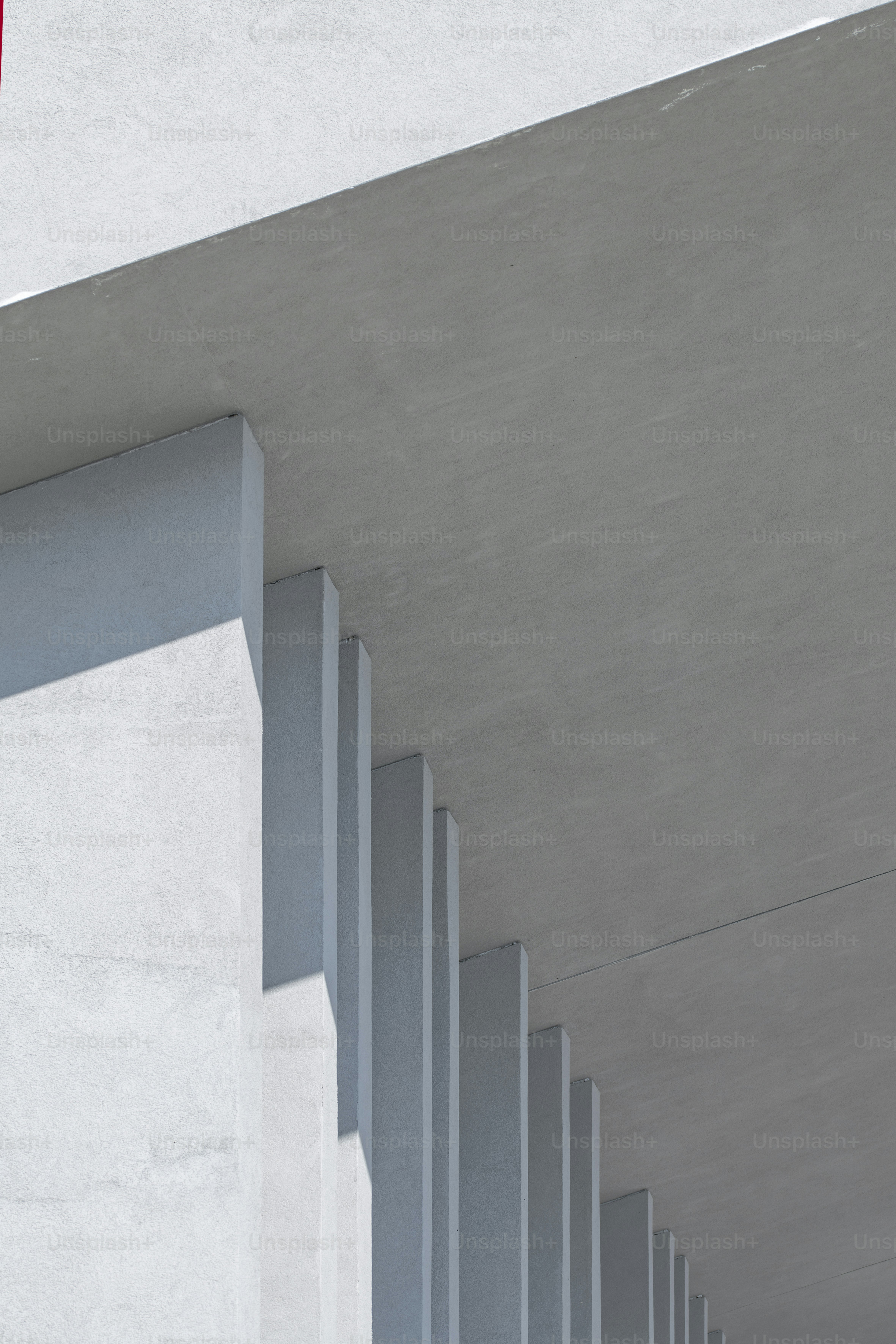 a red stop sign on the side of a building