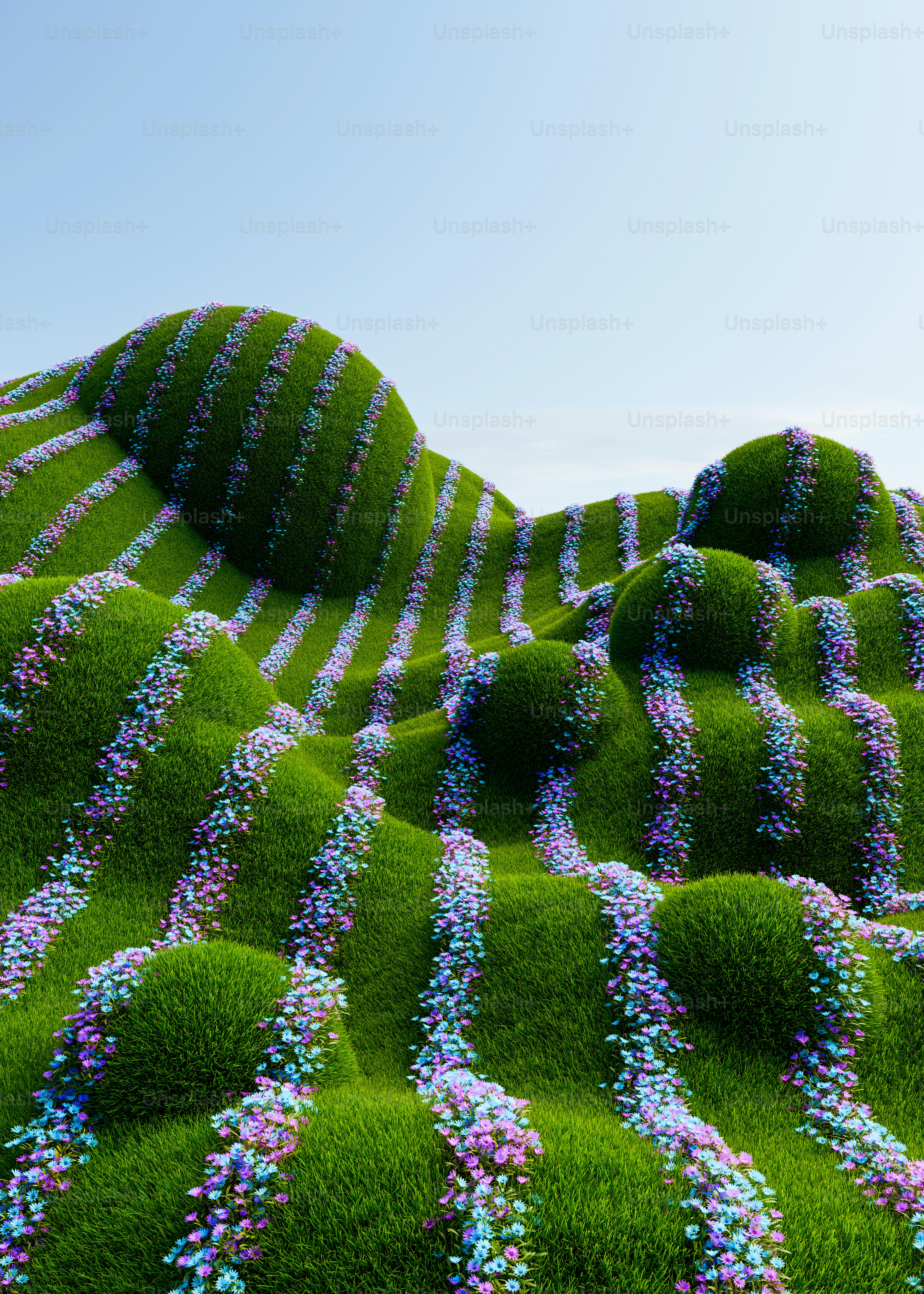 紫や青の花が咲き乱れる緑の草原