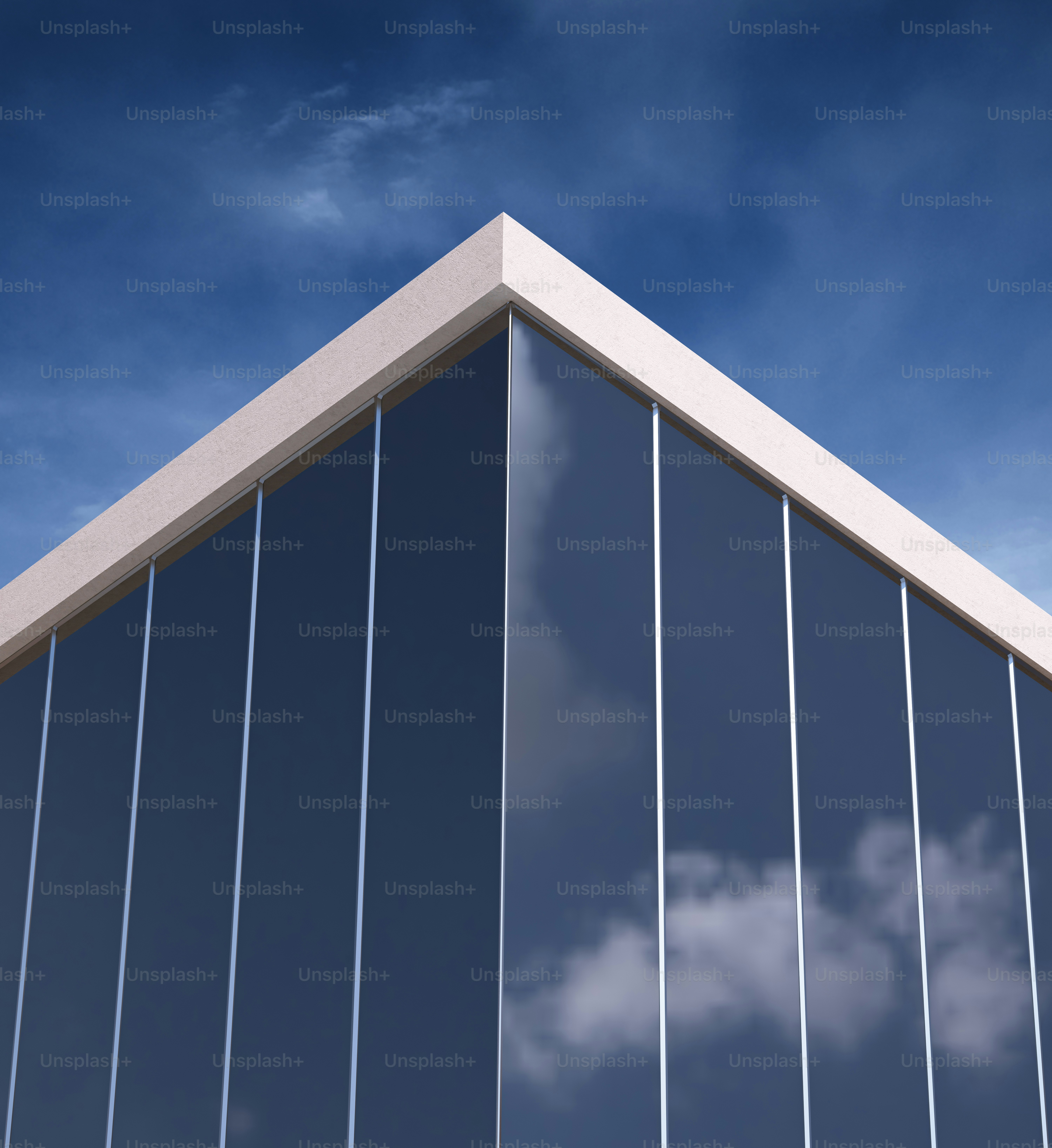 A tall building with lots of windows against a blue sky photo – Corner ...