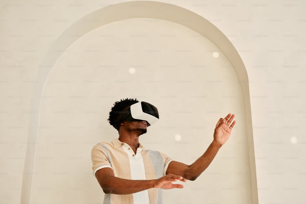 a man in a white shirt and a black and white hat